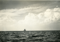 SAILBOAT AND CUMULUS CLOUDS