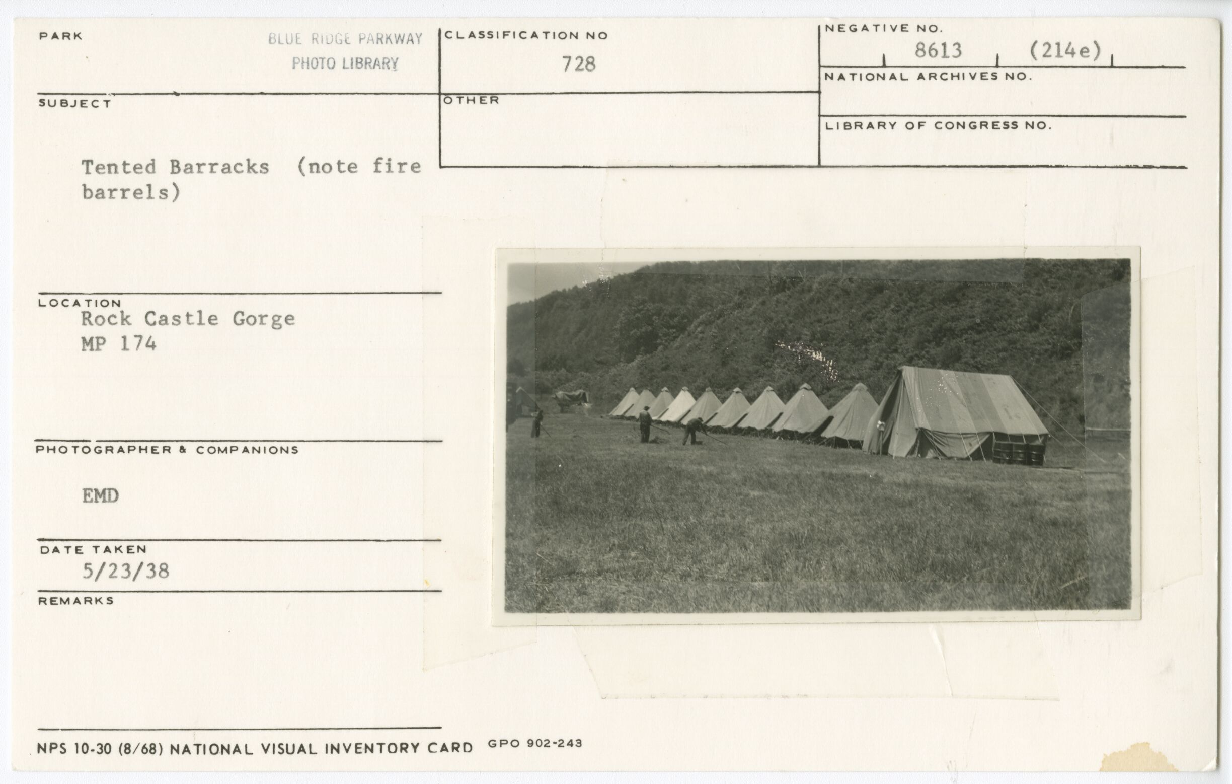 Tented barracks showing fire barrels