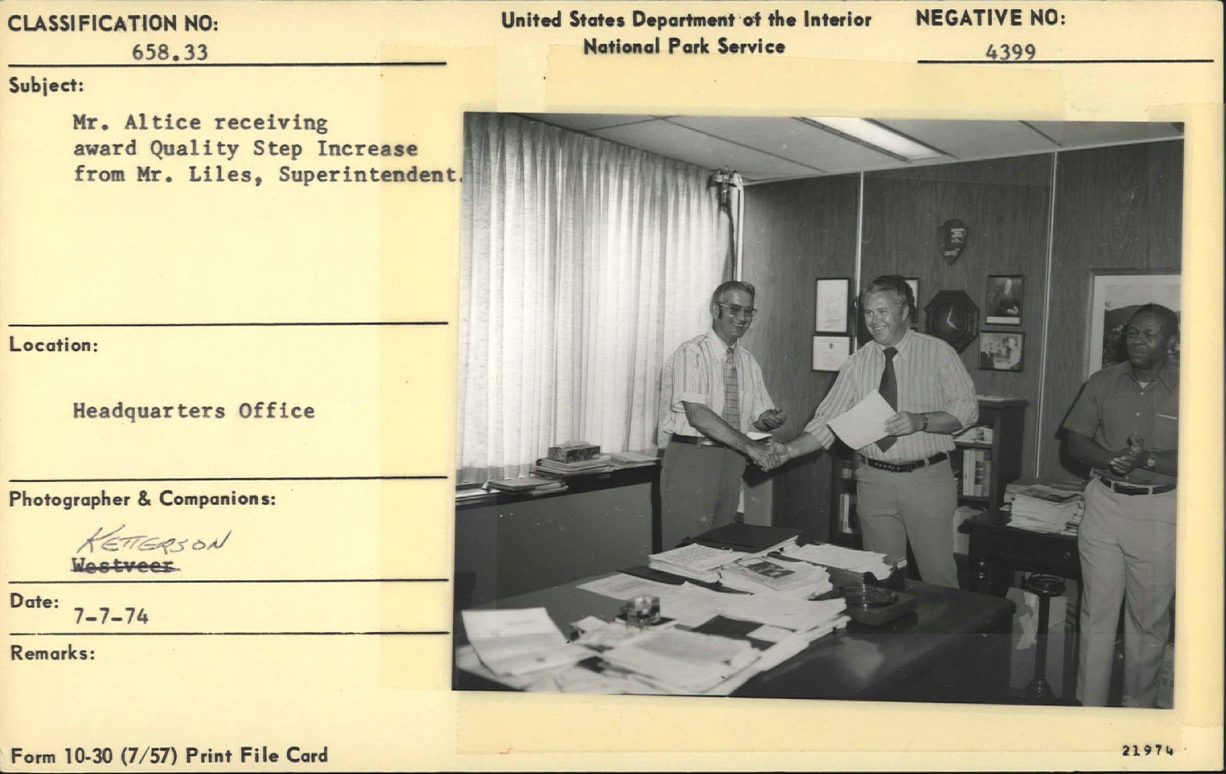 Mr. Altice receiving award for Quality Step Increase from Superintendent Liles