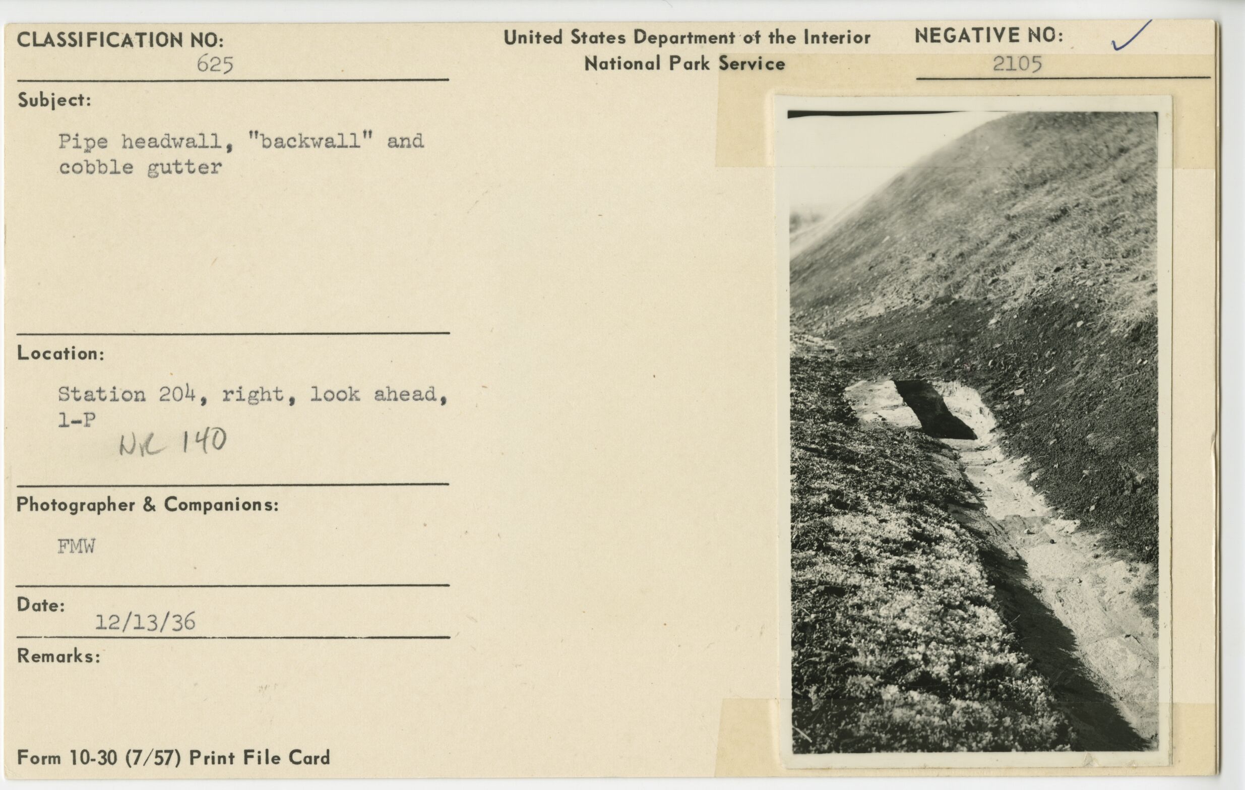 Pipe headwall, "backwall" and cobble gutter