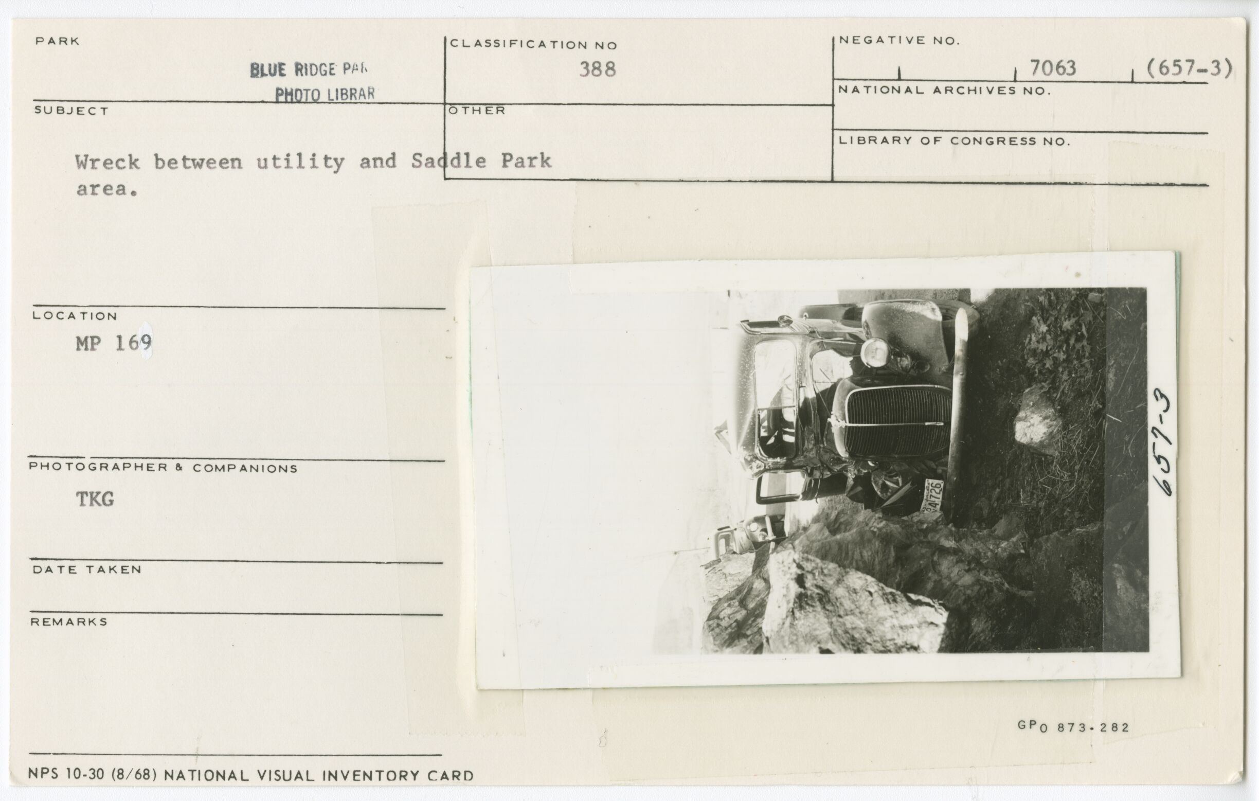 Wreck between utility and Saddle Parking Area