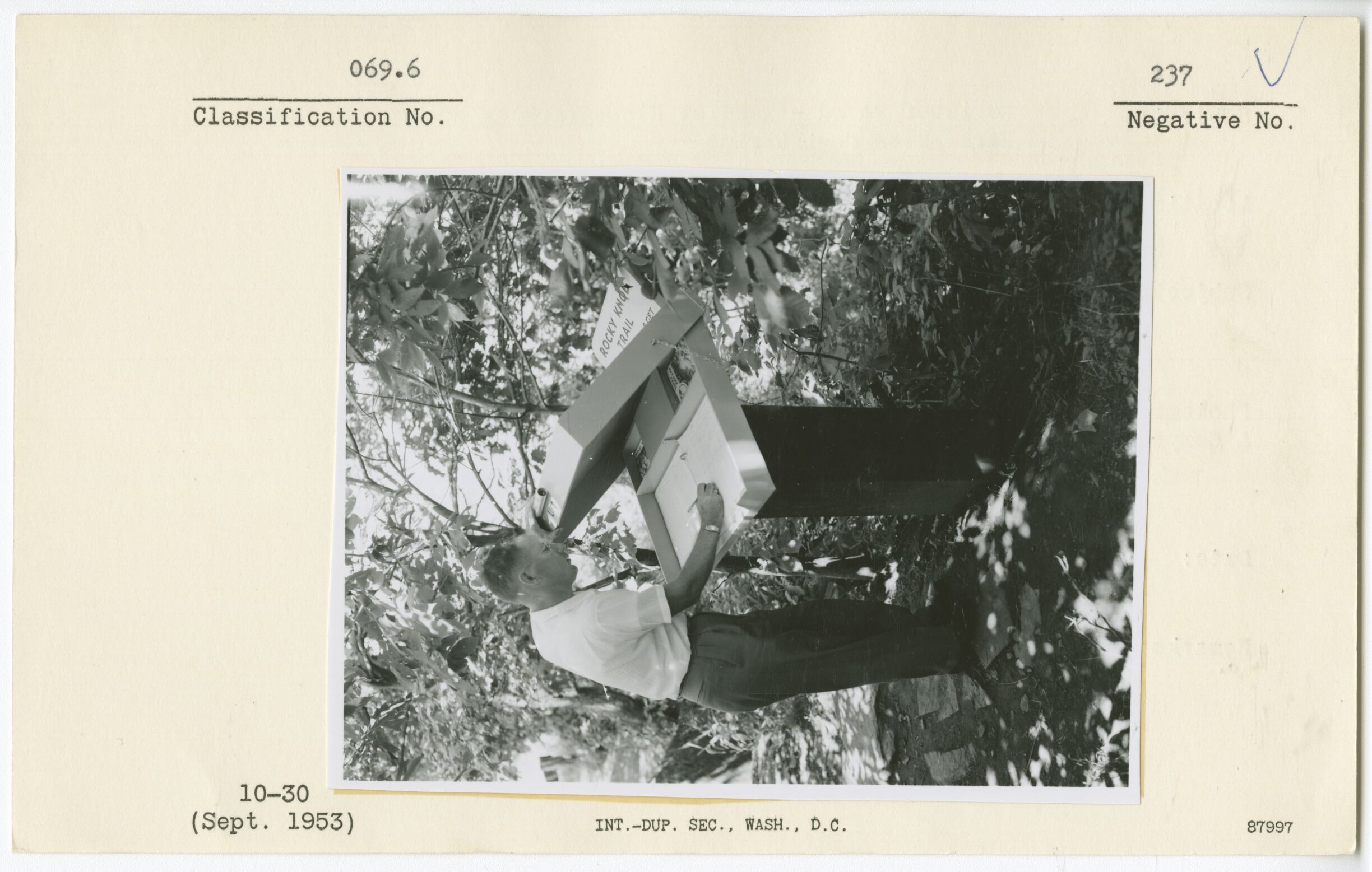 Register stand - leaflet dispensary on Rocky Knob Trail, Earl Estes registering