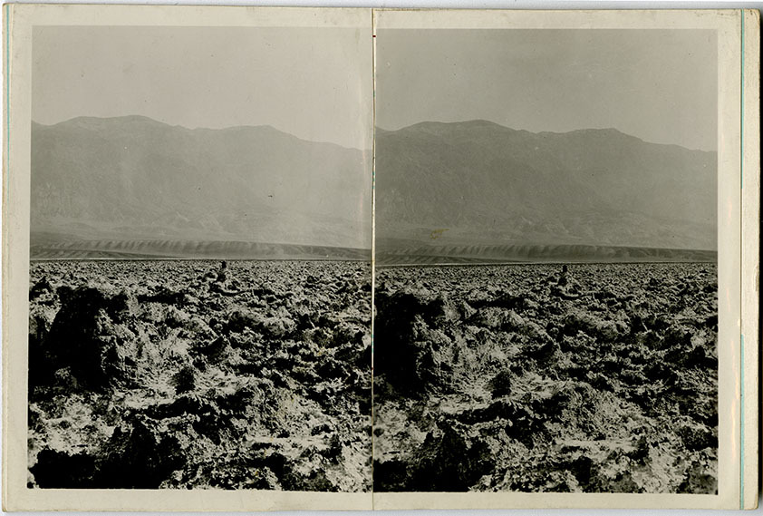 This is an historic black and white photograph from the Scotty's Castle Historic Photograph Collection, Death Valley National Park of Death Valley scene. Formations similar to current day Devil's Golf Course. Circa 1930. Photographed by Mat Roy Thompson.