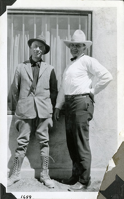 This is an historic black and white photograph from the Scotty's Castle Historic Photograph Collection, Death Valley National Park of Albert M. Johnson and Paul Rader, a Chicago Evangelist and friend, probably at Upper Grapevine Ranch. April 21, 1928. Photographed by Mat Roy Thompson.
