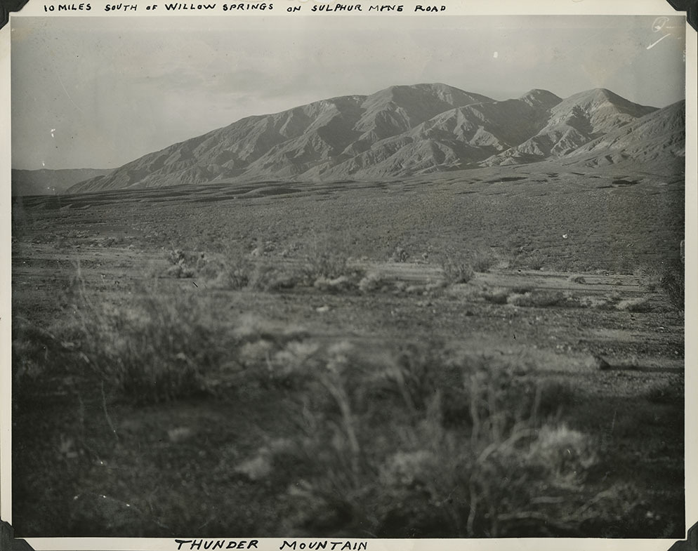 This is an historic black and white photograph from the Scotty's Castle Historic Photograph Collection, Death Valley National Park of Thunder Mountain south of Willow Springs on Sulphur Mine Road. Circa 1931. Photographed by Mat Roy Thompson.