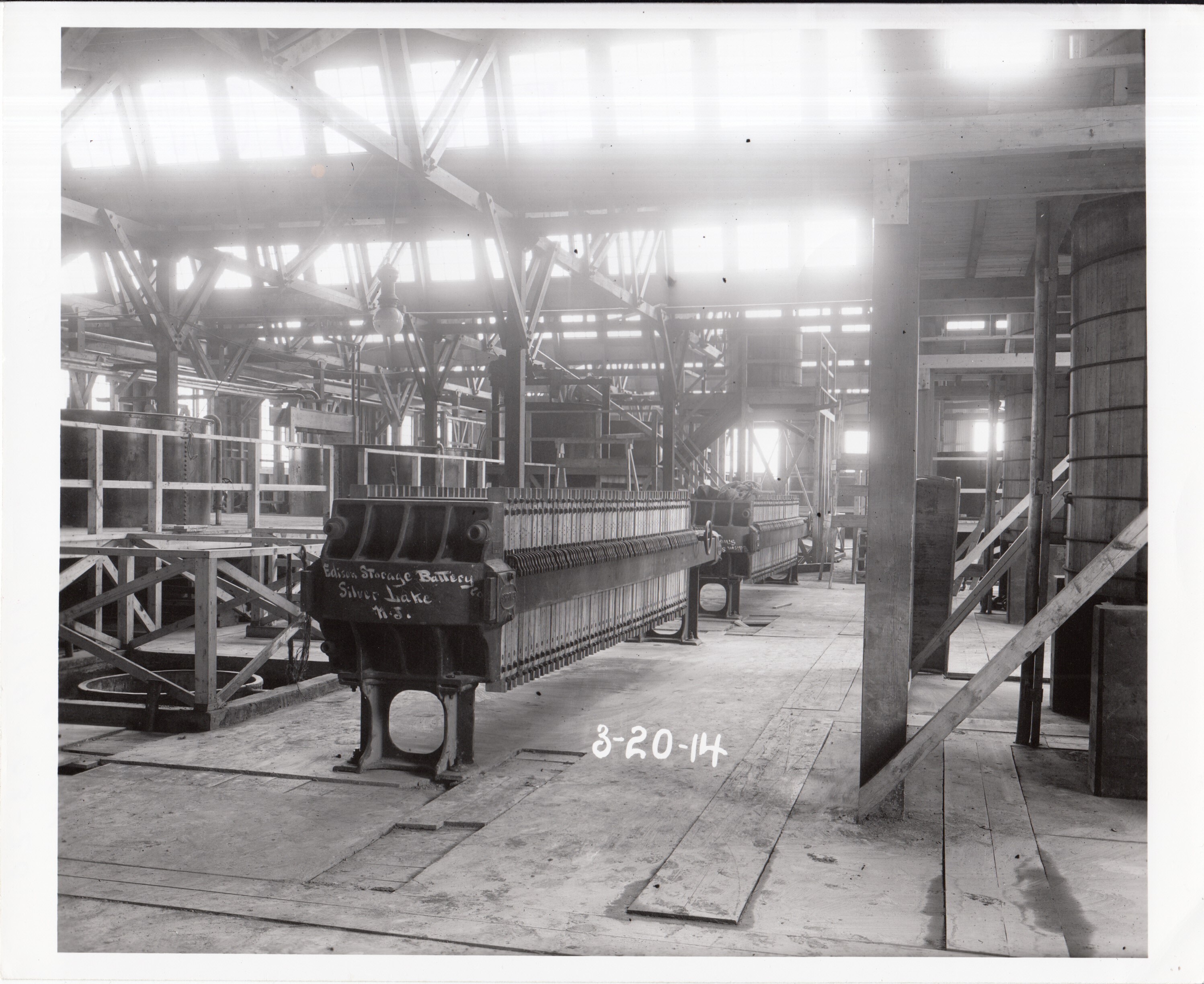 Nickel sulphate presses at chemical works. "Edison Storage Battery Silver Lake" written on machine.