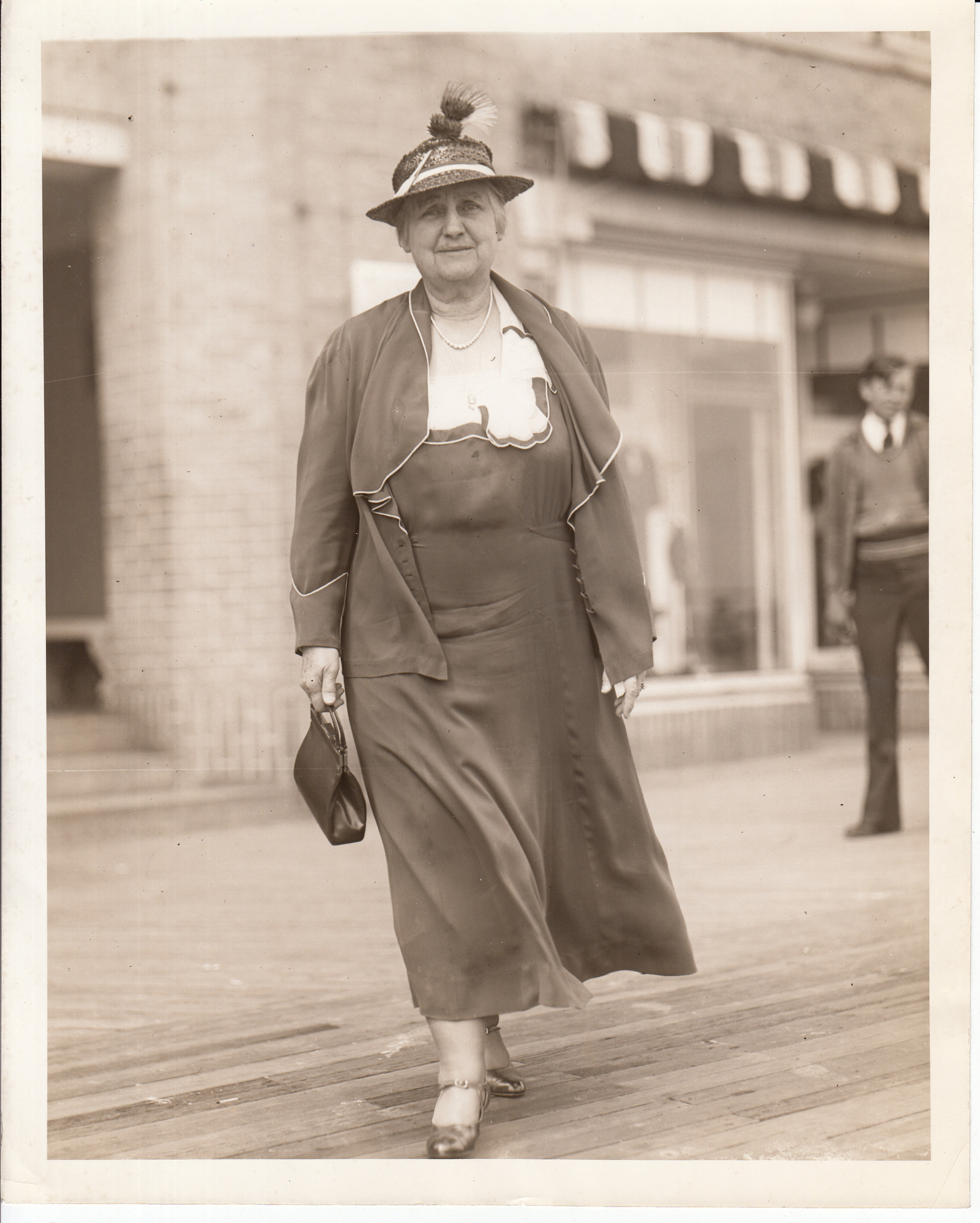 Mina Edison walking on Atlantic City Boardwalk.