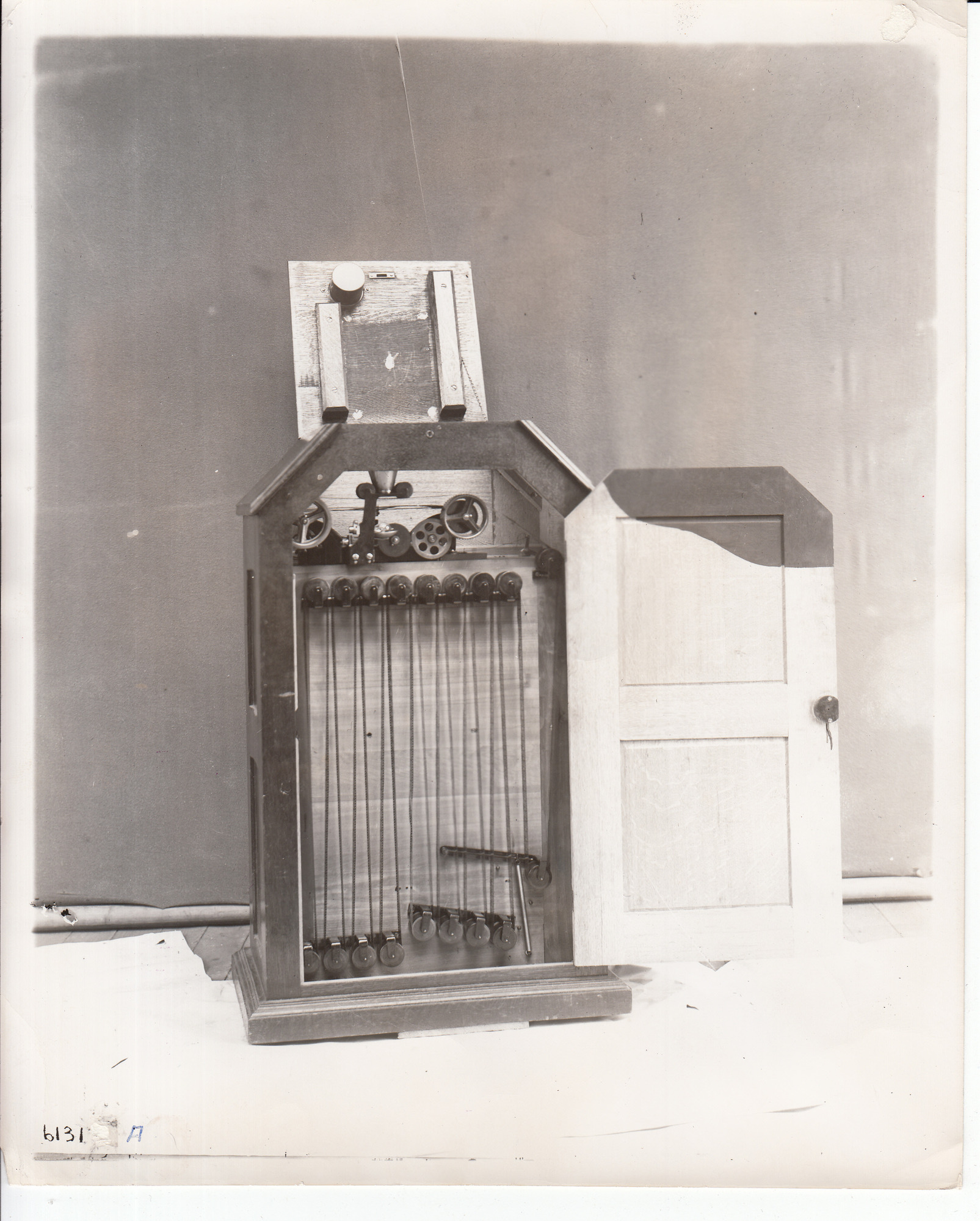Kinetoscope. door open revealing mechanism.