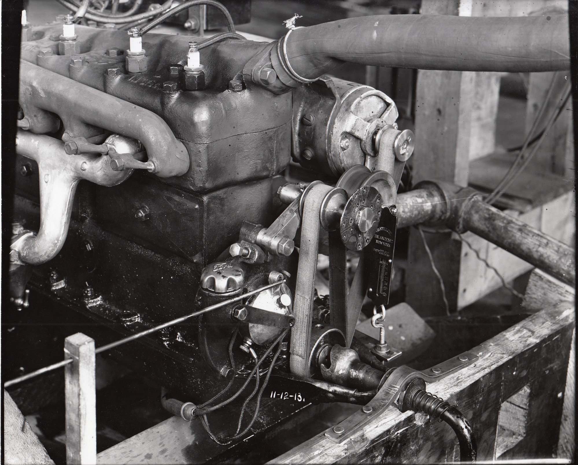Ford automobile engine with belt-driven generator.
