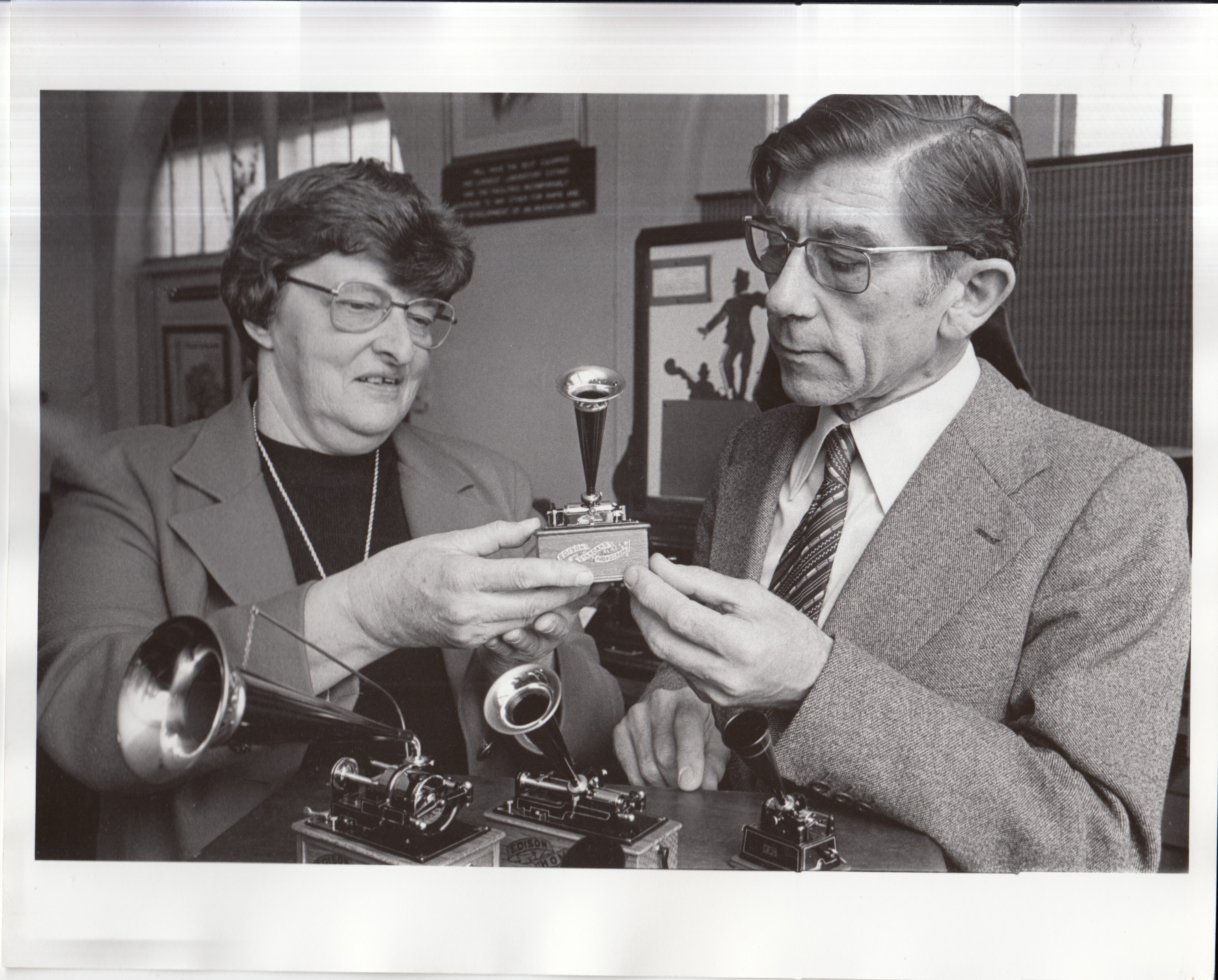 Manuel Olive Sans and Betty Alborough, curator, with miniature phonographs given to the Edison Museum.