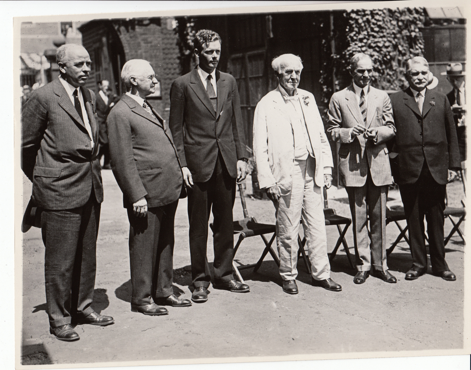 Judges of the Edison Scholarship Contest: Dr. Lewis Perry, George Eastman, Charles Lindbergh, Thomas Edison, Henry Ford and Samuel W. Stratton in the Laboratory courtyard.