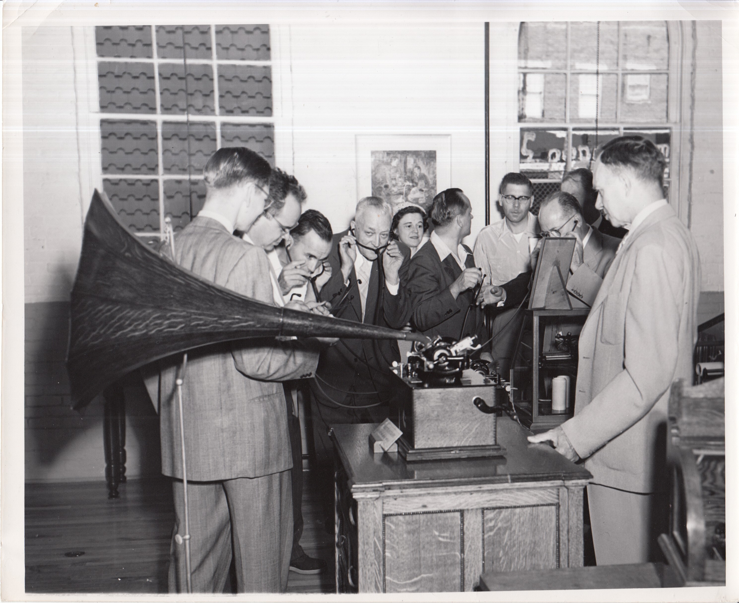 Visitors listening to phonographs at Edison Museum.