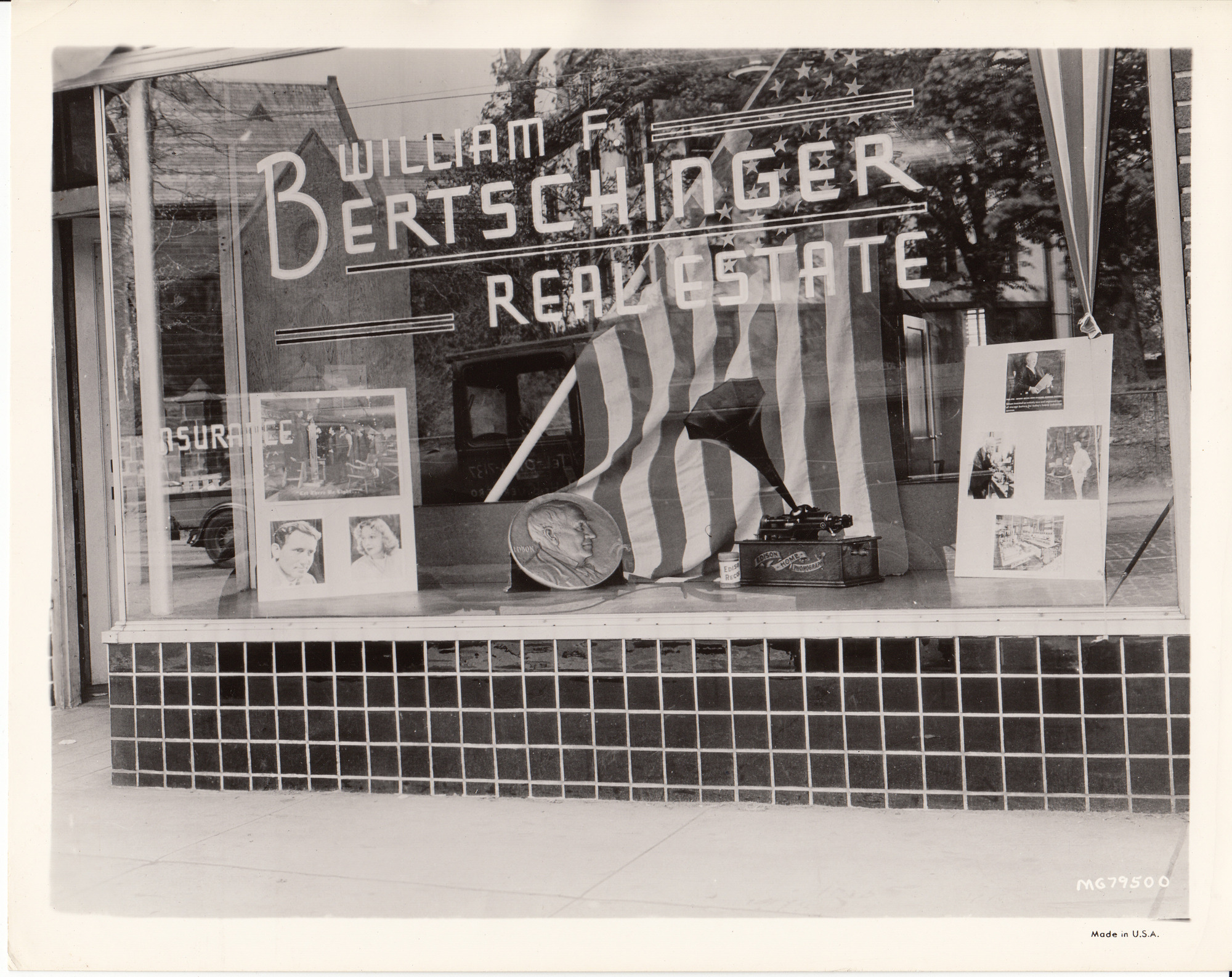 Store window of William F. Bertschinger Real Estate decorated for Edison Pageant of Progress.