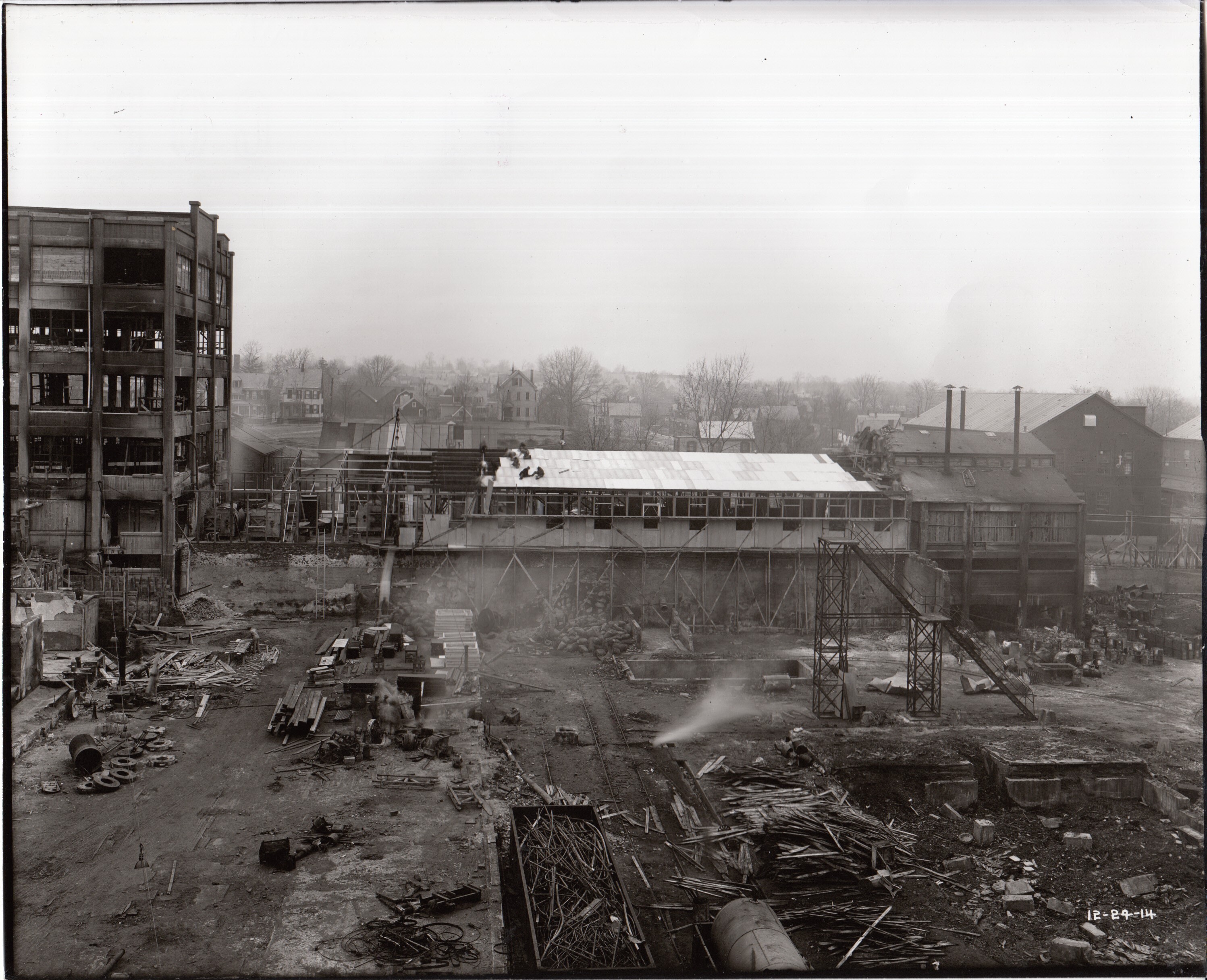Toward Alden Street from Building 25, roofing of Building 24 extension.