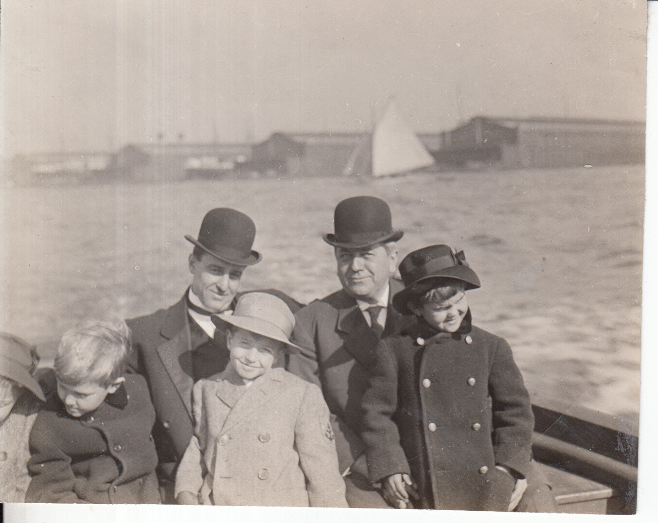 Miller Reese Hutchison, Robert Bachmann, and their children aboard the tugboat "William J. Baxter," to observe the mobilization of the Atlantic fleet.
