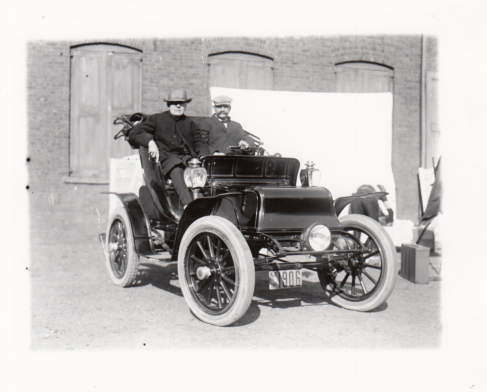 Thomas Edison and Fred Ott in electric automobile.