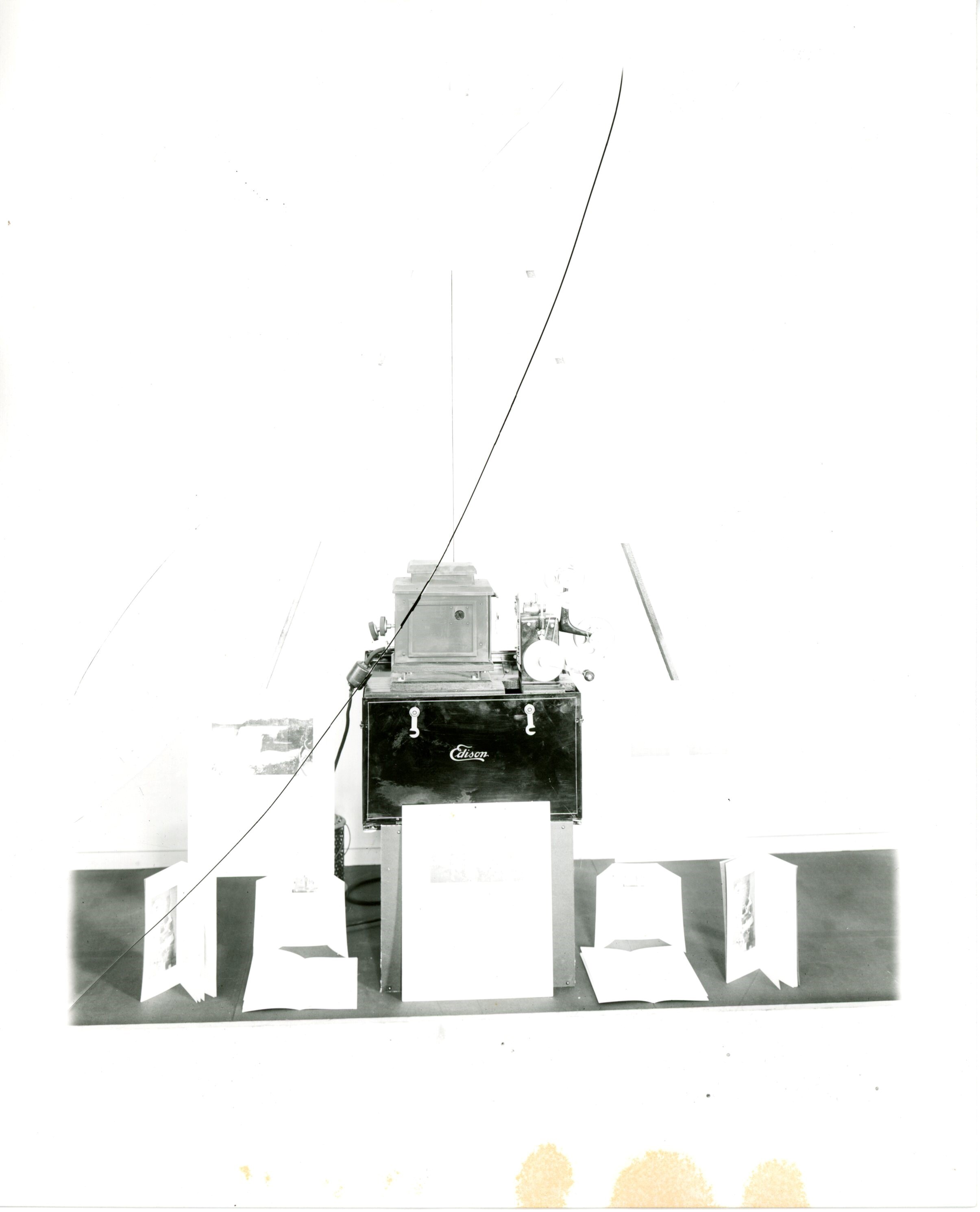 Edison home projecting kinetoscope, window display.