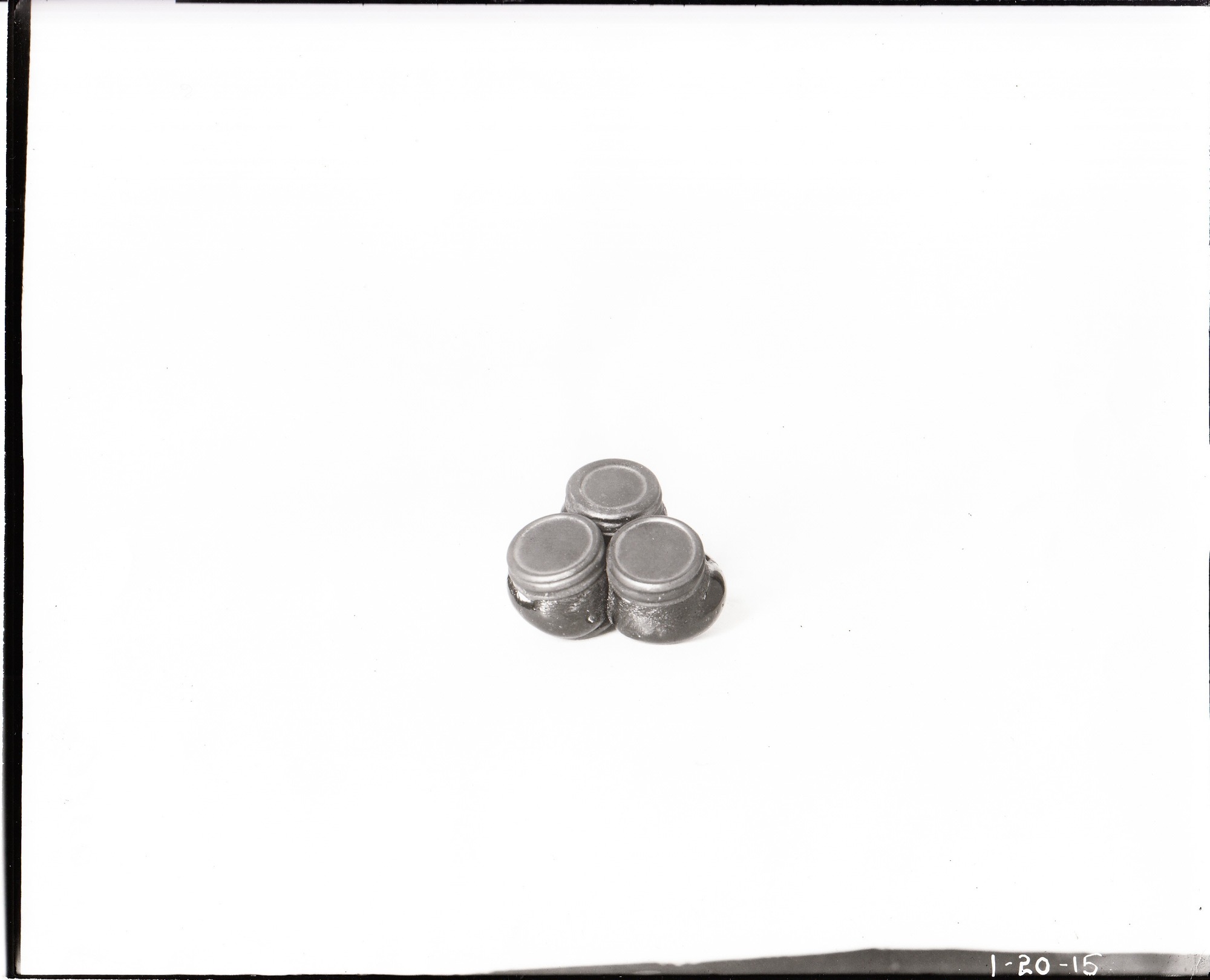 Three bottles of diamonds fused together during fire.