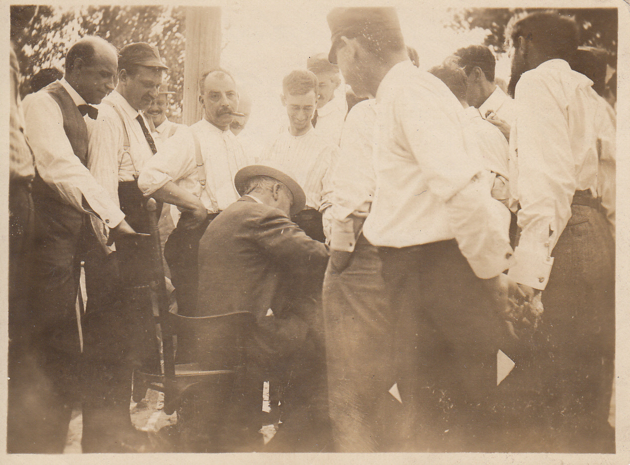 Thomas Edison signing autographs at the Edison Cement Works.