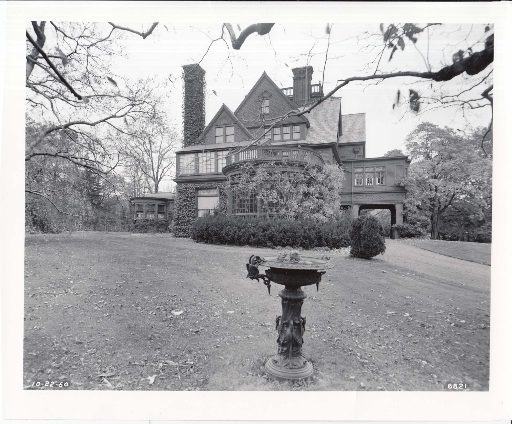 Glenmont, exterior, side. Birdbath in view.