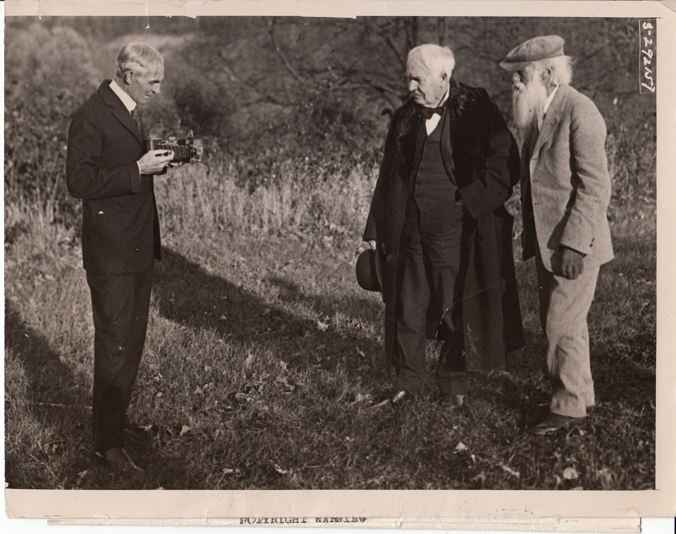 Henry Ford taking a photograph of Thomas Edison and John Burroughs at the Yama Farms Inn.