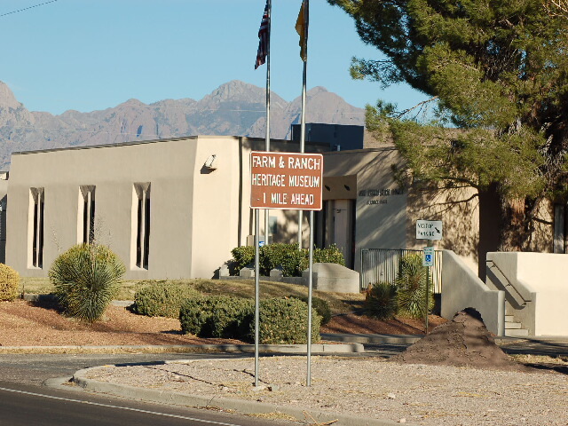 A building with a sign in front of it.