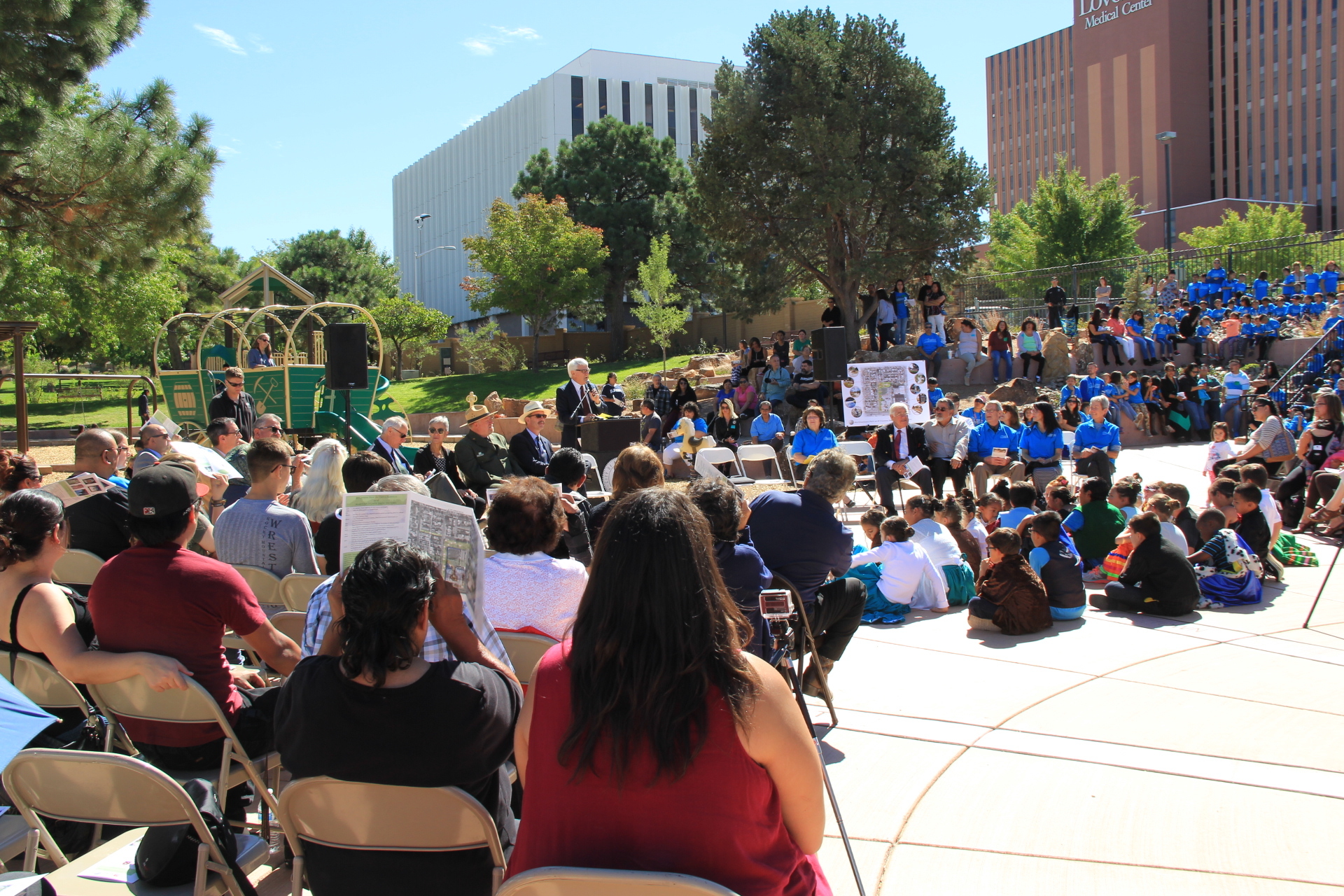A group of people sitting in chairs.