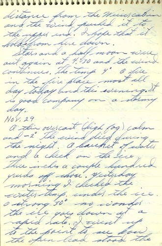 Image of handwriting in blue ink on spiral bound notebook.