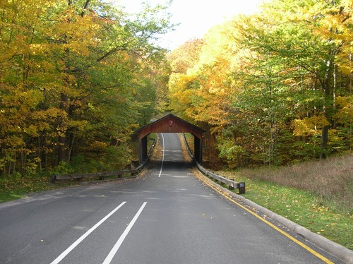 Fall colors around the Covered Bridge on the Pierce Stocking Scenic Drive.