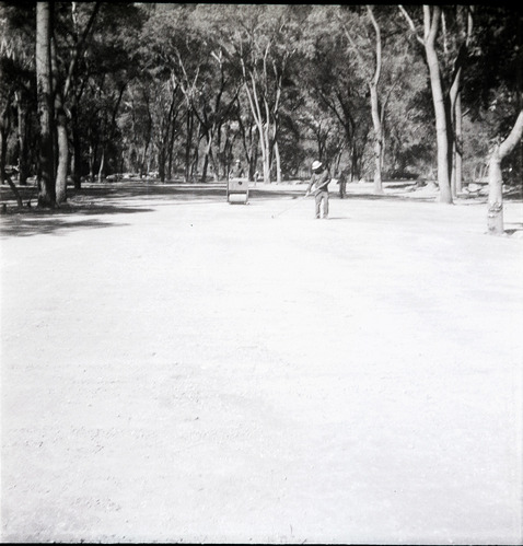 Men working on road construction for The Grotto parking area.