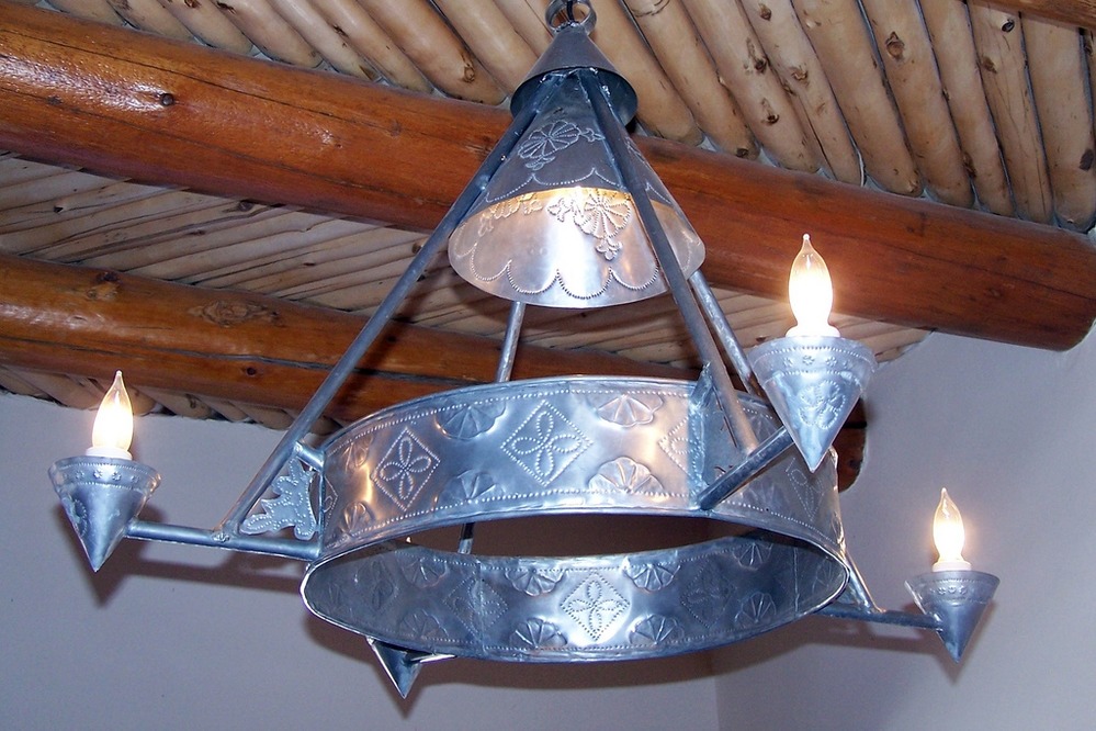 The CCC created different designs of Spanish Colonial Style punched tin light fixture for the Painted Desert Inn in the 1930s.