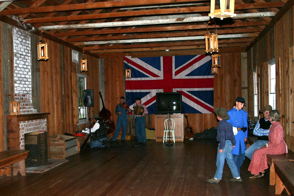 The Royal Marine Barracks is decked out with lanterns and the folkgroup Sugar on the Floor tunes up for the Candlelight Ball.