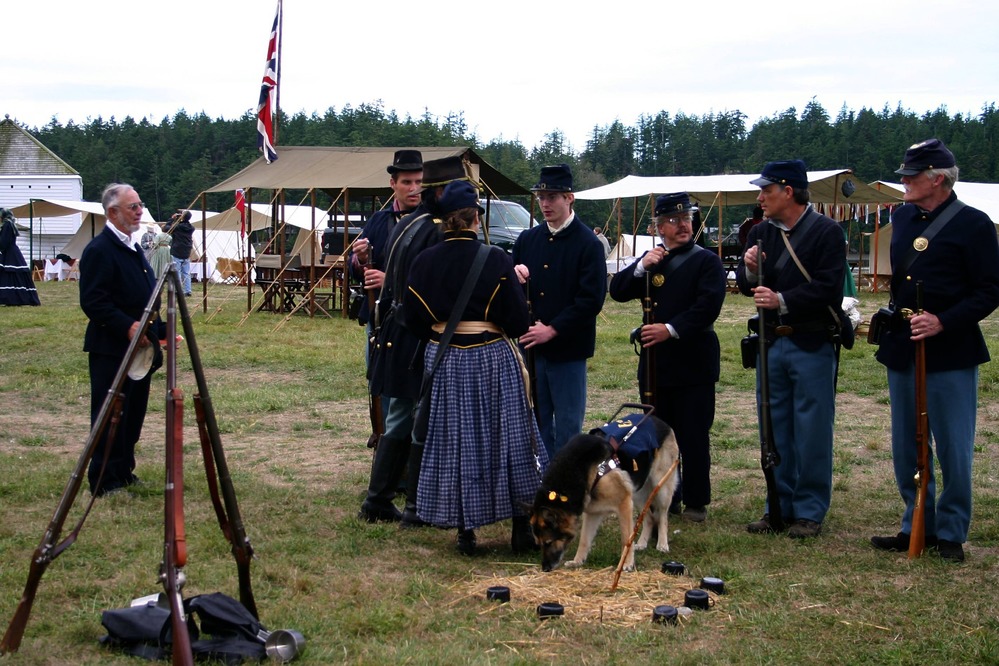 Park Ranger Darlene Wahl checks with Battery D formation prior to the re-dedication ceremony at Encampment 2007.