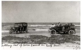An automobile is stuck in the Padre Island sand in this photo from 1919. The original photo is in the Padre Island photographic archives.