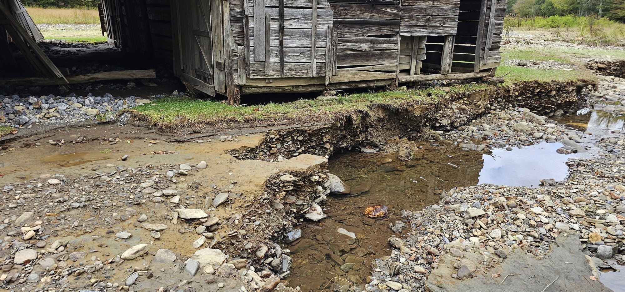Photo shows erosion Upper Cataloochee Valley Road, near Caldwell Barn