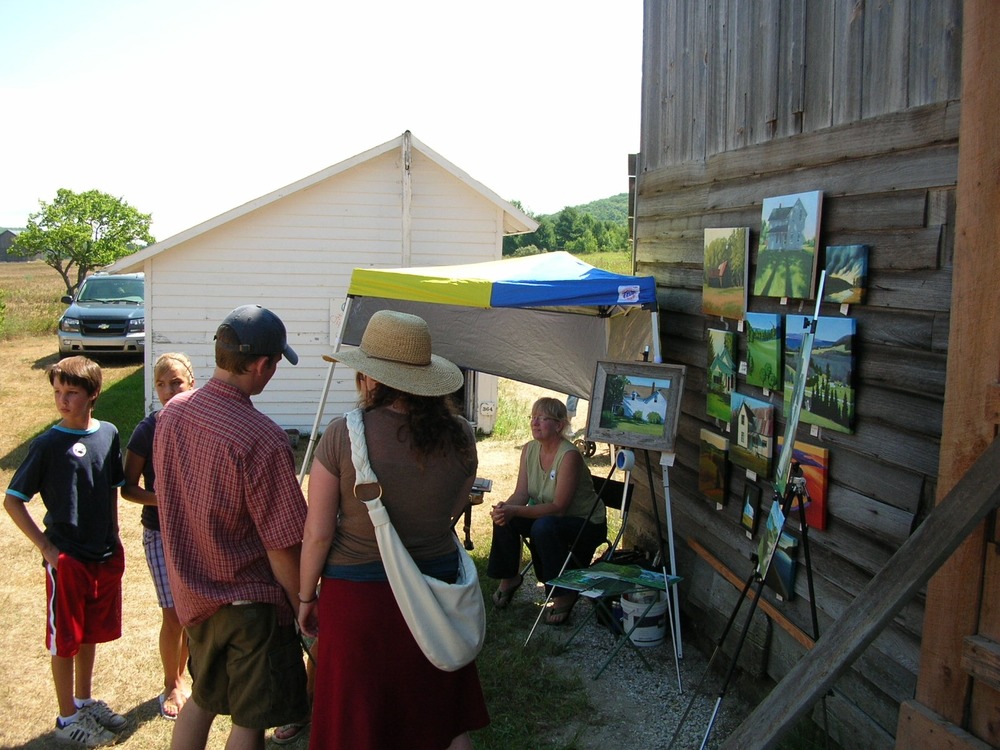 Painters demonstrate their craft at the Dechow Farm.