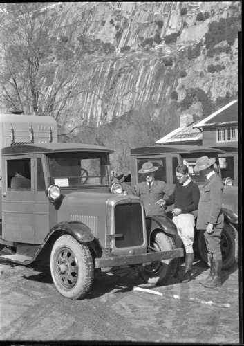 L-R: Resident engineer O.G. Taylor, Mr. L.B. Barrett & Acting Supt. Leavitt inspecting newly delivered GMC trucks.