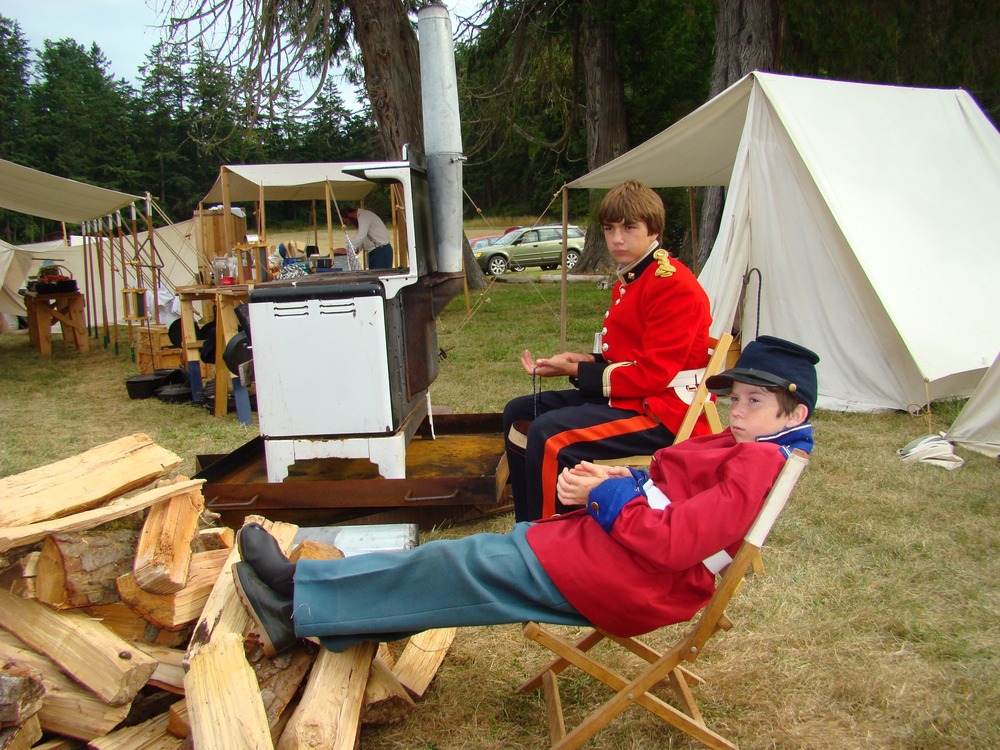 Jesse Wildman and Max Haenel of Chillwack, BC and Friday Harbor respectively take a break before call to colors at Encampment 2008.