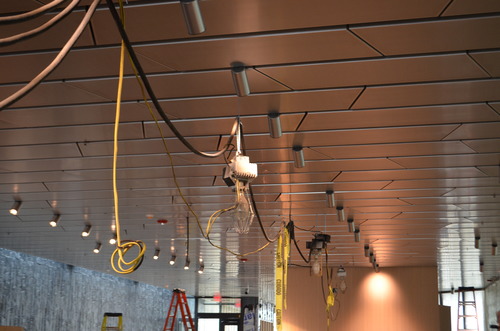 Silver metallic ceiling with imbeded track lighting