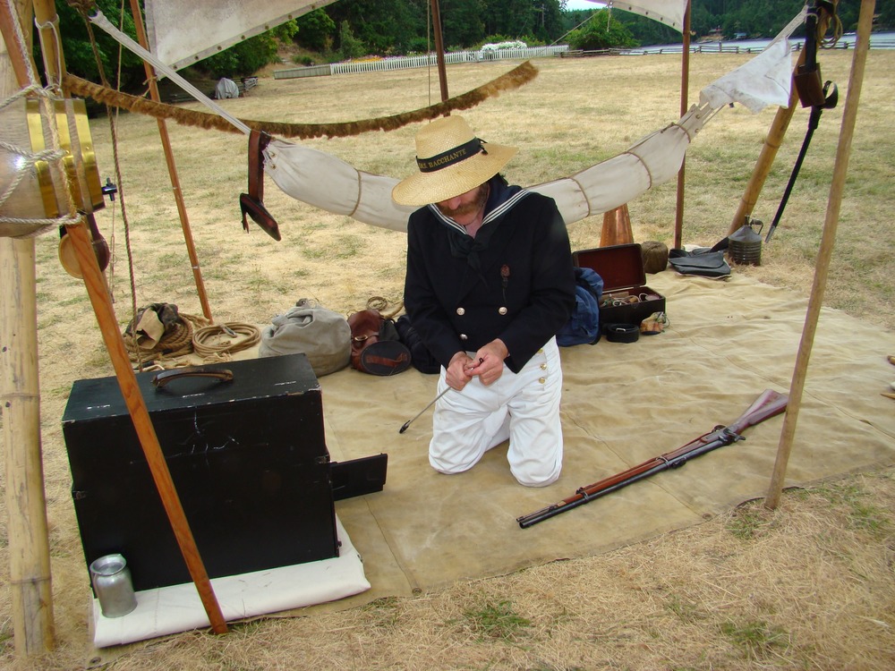 David Funk of Burnaby, British Columbia, readies his kit for the black powder deomnstration at Encampment 2008