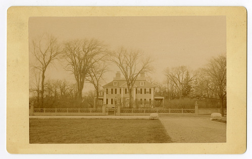 Albumen print of facade of Georgian mansion, taken from across the street.