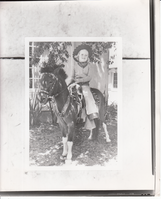 Madeleine E. Sloane [grandchild of Madeleine Edison Sloane and great grandchild of Thomas Edison?] sitting on a pony.