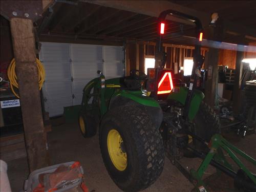 Photos of John Deere 4120 for equipment replacement purposes.
