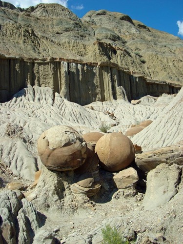 Sandstone concretions and eroding bentonite clay at the North Unit's Cannonball Concretions pullout.