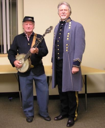 Mike Vouri and Michael Cohen pose for audience members after a full-house show in 2007 at the Washington State Library.