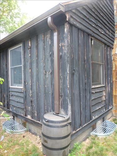 Replace the Roof Covering and Gutter System on the Visitor Center at Prince William Forest Park in June 2015