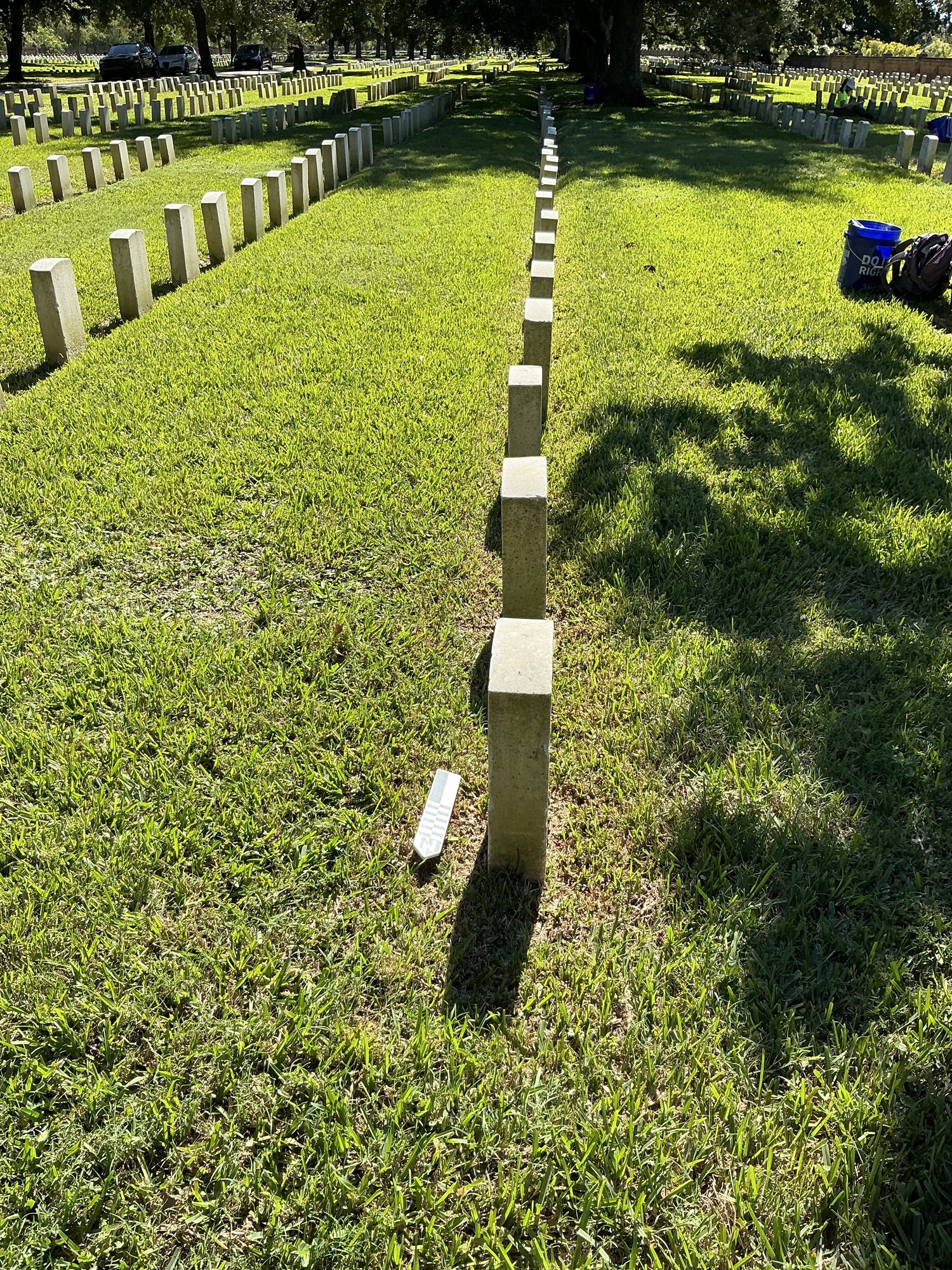 Extra image of historic upright marble headstone with recessed shield face.