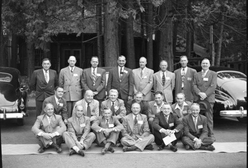 Region Four Area Superintendents with Reg. Dir. O.A. Tomlinson. LEFT TO RIGHT: STANDING: Hugh Peyton, Millerton Lake; Ernest Leavitt, Crater Lake; Carl Russell, Yosemite; Preston Macy, Olympic; Oscar W. Carlton, Asst. Supt. Sequoia-Kings; William H. Gibbs, Pinnacles; Frank R. Givens, Joshua Tree; and Walter Finn, Muir Woods. KNEELING: Donald M. Robinson, Cabrillo N.M.; Eivind Scoyen, Sequoia-Kings; John C. Preston, Mt. Ranier, Don Fisher, Lava Beds; Grant H. Pearson, Mt. McKinley; and Ben C. Miller, Sitka N.M. SEATED: Francis R. Oberhansley, Hawaii; Robert K. Weldon, Whitman N.M.; Tom R Goodwin, Death Valley; O.A. Tomlinson, Regional Director, Region Four; Dan T. Tobin, Lassen Volcanic; Sam Houston, Craters of the Moon.