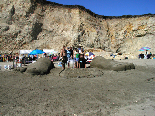 2002 Sand Sculpture Contest Adults’ Group 2nd Place Winner: Head in Clouds, Feet in Sands