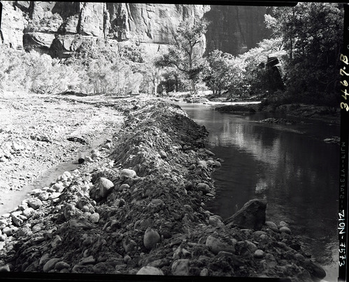 Road repair of flood damage, valley road diverted Virgin River so damage could be repaired.